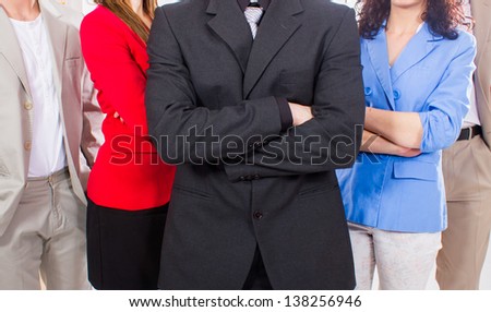 Portrait  group of business people standing together in office. Head and his staff.
