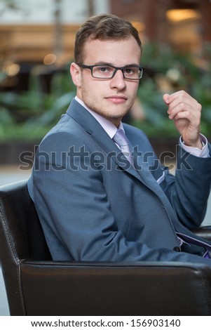 Business man in a suit and shirt with tie portrait.
