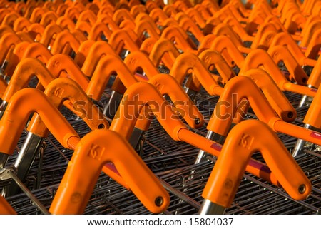 Rows of trolley handles near the shops