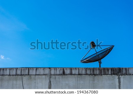 A Satellite Dish Above On Blue Sky Background