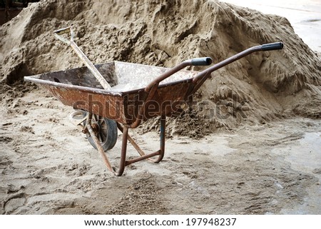 wheelbarrow to work area at a building site