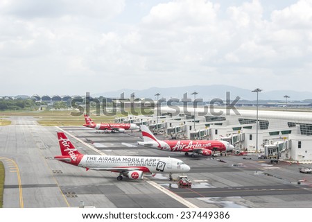 KUALA LUMPUR, MALAYSIA -  DECEMBER 10, 2014 : Air Asia Airplanes at KLIA2 airport. Air Asia is a fast growing low cost carrier based in Malaysia.
