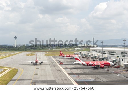 KUALA LUMPUR, MALAYSIA -  DECEMBER 10, 2014 : Air Asia Airplanes at KLIA2 airport. Air Asia is a fast growing low cost carrier based in Malaysia.