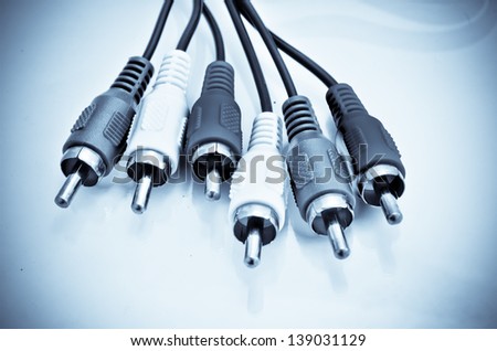 Close-up view of audio and video cables. Isolated on white