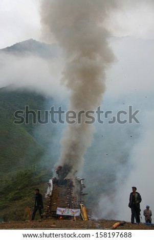 LIJIANG, CHINA - SEPTEMBER 19: Cremation ceremony of Mosuo Minority People on September 19, 2013, Yongning, Linlang, Lijiang, China