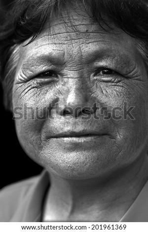 Black and white portrait of a Chinese old woman