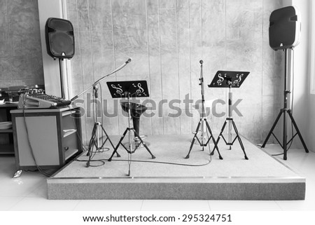 Music stage or singing background, microphone and speakers made with black and white color.