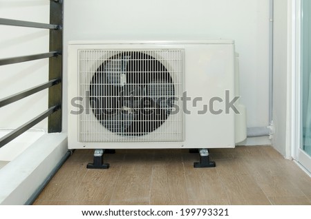 air conditioners installation outside on the floor