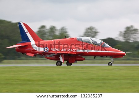 ROYAL INTERNATIONAL AIR TATTOO, RAF FAIRFORD, GLOUCESTERSHIRE, UK - JULY 7: Red Arrow Hawk T1A XX323 landing on July 7, 2012 at the RIAT display at RAF Fairford, Gloucestershire, UK.