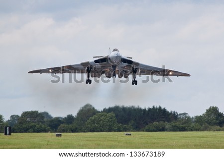 ROYAL INTERNATIONAL AIR TATTOO, RAF FAIRFORD, GLOUCESTERSHIRE, UK - JULY 7: Vulcan XH558 landing on July 7, 2012 at the RIAT display at RAF Fairford, Gloucestershire, UK.