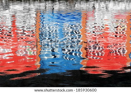 abstract water reflection with houses