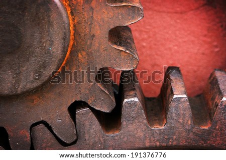 rusty and metallic gear wheel of old industry
