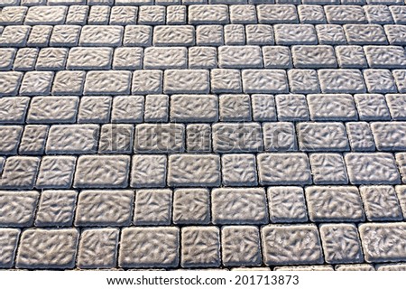background with floor tiles of granite paving stones