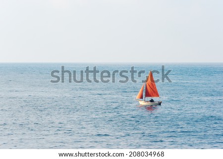 small sailboat on the water
