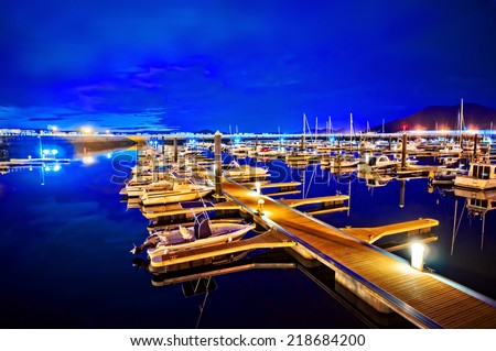 marina at night with moored yachts in Laredo