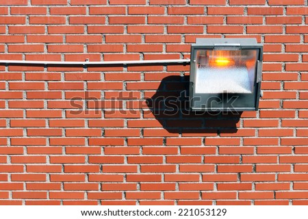 halogen lamp on wall outdoors