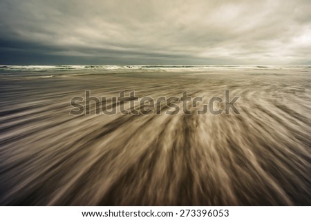 abstract seascape with long exposure and rip current lines. Vintage filter.