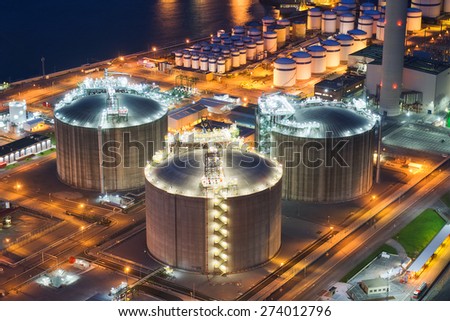 storage tanks on industrial plant at night