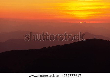 mountain silhouettes at the sunset