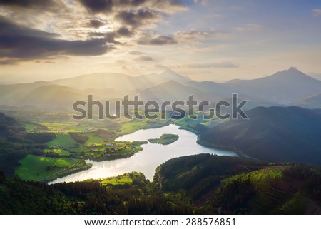 view of Urkulu reservoir in Basque Country with sun rays