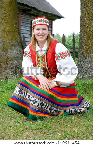 Portrait of a beautiful young women in national dress of Belarus.