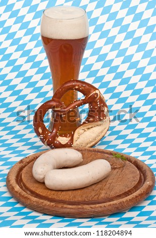 Weisswurst is a traditional Bavarian dish. It is usually served with Pretzel, sweet mustard and Weissbier.