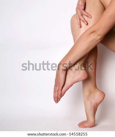 stock photo Beautiful legs and arms isolated on a white background