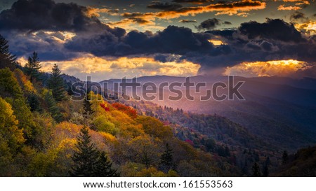 A Single Shaft Of Golden Dawn Sunlight Illuminates Autumnal Ridges And Valleys In Great Smoky Mountains National Park