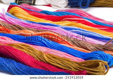 Skeins of brightly colored embroidery floss