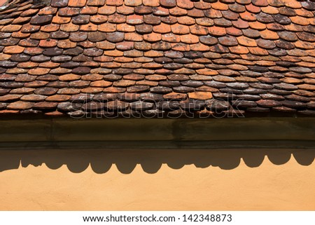close up red roof tile of old house