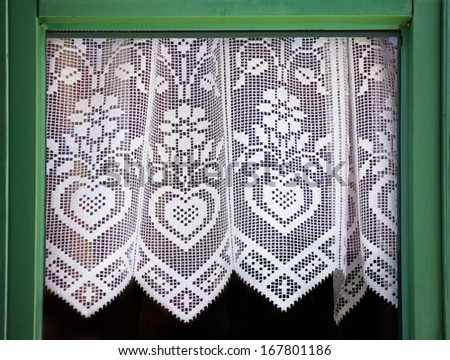 Lace curtain with a hearts, symbol of love