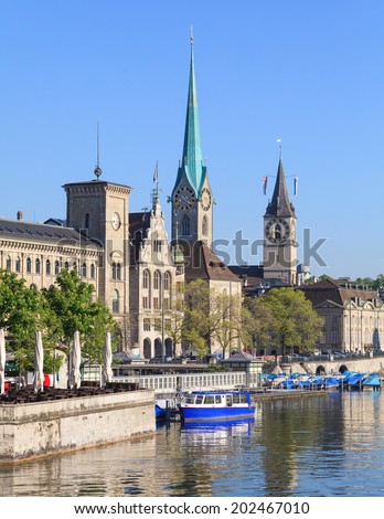 Zurich landmarks: the Lady Minster (German: Fraumunster), the St. Peter Church and the City Hall (German: Stadthaus)