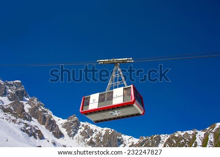 COURCHEVEL, FRANCE - APRIL 03, 2011: Gondola in Courchevel, France on April 03, 2011. The cable car  connecting Saulire mountain and place of Les Verdons restaurant in Courchevel.