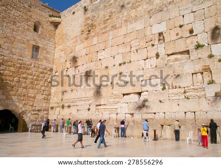 WESTERN WALL, JERUSALEM - 3 APRIL: People are praying at the Western Wall in Jerusalem, Israel on April 3, 2012. The Western Wall is one of the most famous historical and religious landmarks.