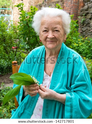 Portrait of smiling old woman