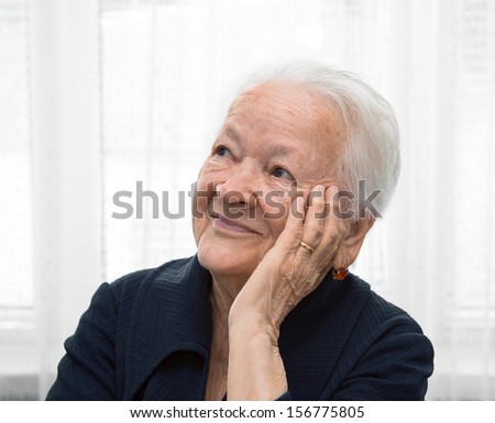 Portrait of smiling old woman