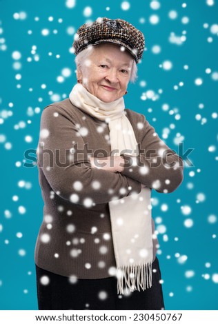 Portrait of old woman in hat. Christmas and holidays concept
