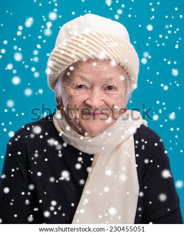 Portrait of old woman in hat. Christmas and holidays concept