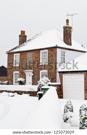 PAGHAM, WEST SUSSEX, ENGLAND Ã¢Â?Â? JANUARY 18: Private house is covered in snow on January 18 2013 in Pagham. The first proper snow fall of the year covers much of the south east of England.