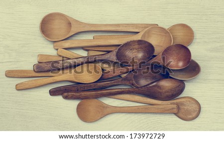 Rustic Wooden Spoon on Wooden Background