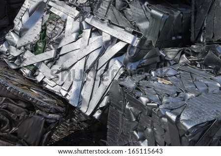 Compressed packages scrap of metal strips