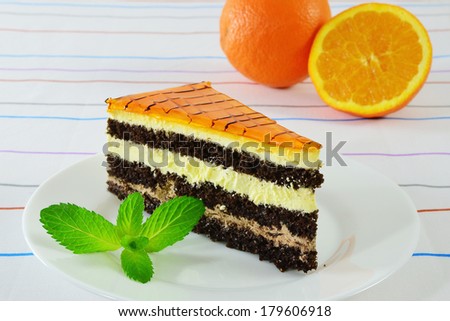 Charlotte cake, orange flavored with chocolate cream.