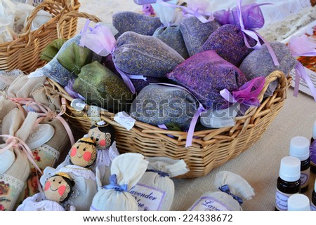 Dried lavender filled sacks, lavender essential oil, lavender products at the farmers market.