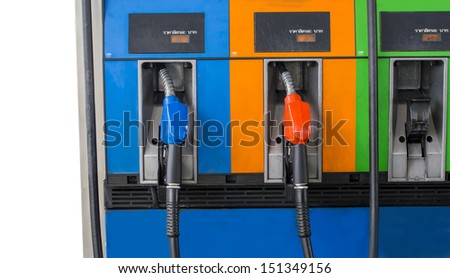 close up front view two fuel nozzle fuel oil gasoline at petrol filling station