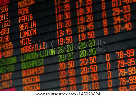 Departures and arrivals electronic orange led schedule in airport