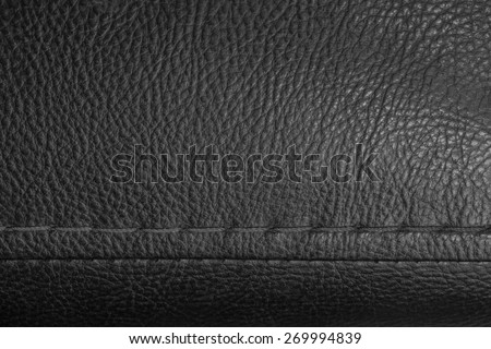 product quality dark leather with a seam stitching