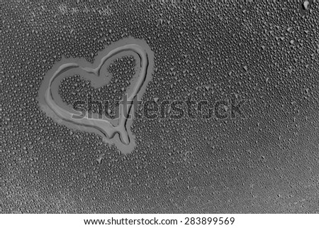 Valentine Day Love heart made by water bubbles on a blue background