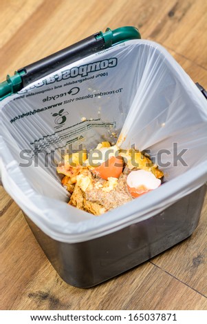 A Bag Of Food Recycling Waste In A Recycling Bin