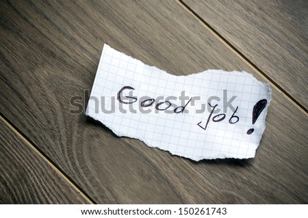 Good Job - Hand writing text on wood background