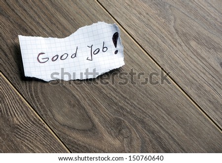 Good Job - Hand writing text on wood background with space for text